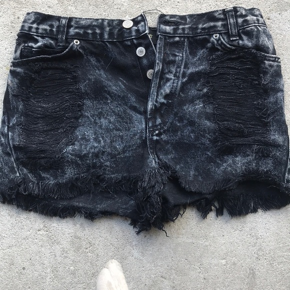 black torn shorts